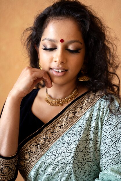 young indian woman wearing sari