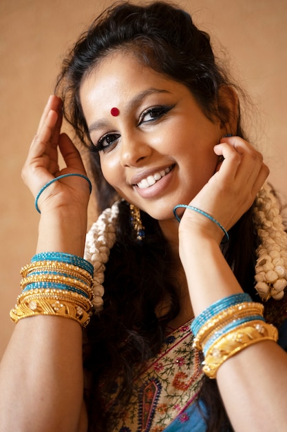 Free photo young indian woman wearing sari