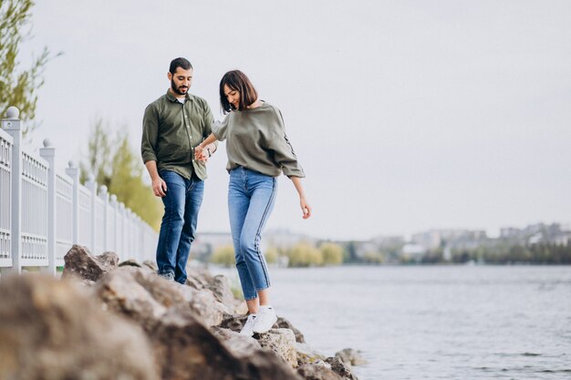 Young international couple together in park