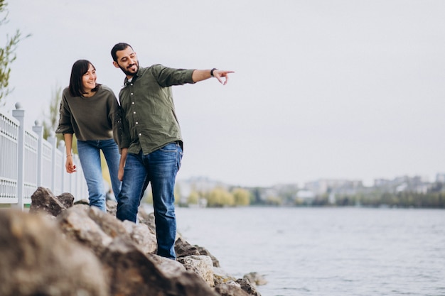 Young international couple together in park