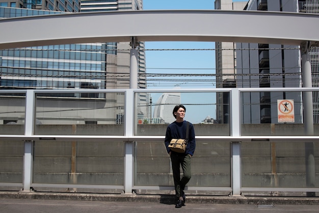 Young japanese man spending time outdoors