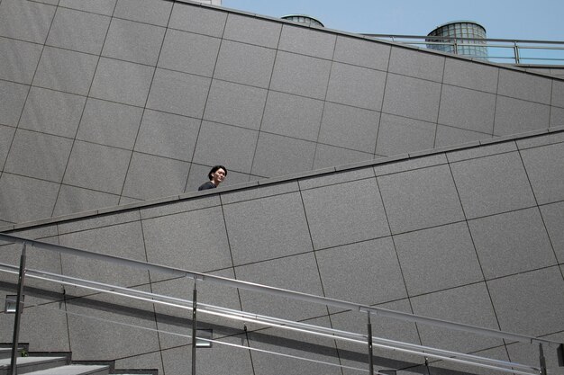 Young japanese man spending time outdoors