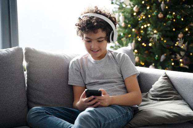 Young kid playing on smartphone