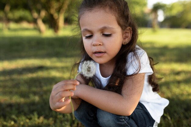 Young kid spending time in nature