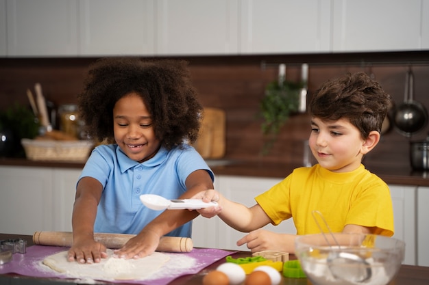Young kids cooking together