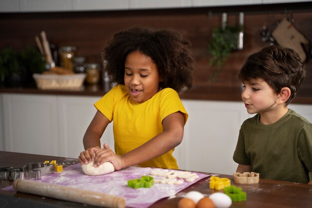 Young kids cooking together