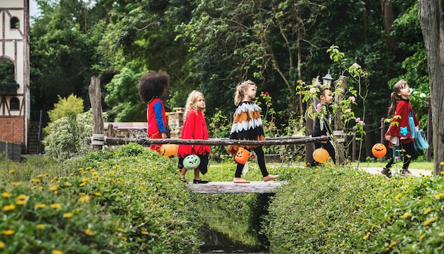 Young kids trick or treating during Halloween