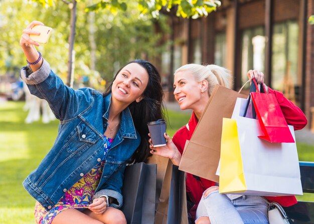 Young ladies doing selfie 