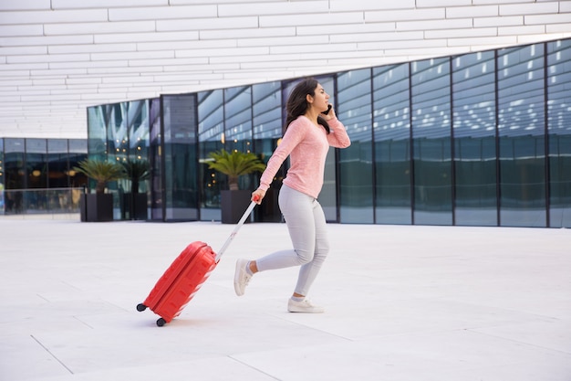 Young lady being late for boarding plane