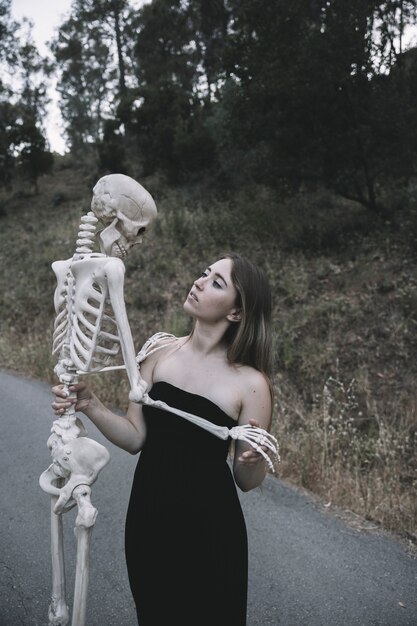 Young lady holding bones