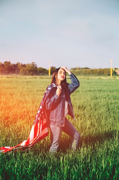 Young lady posing in field