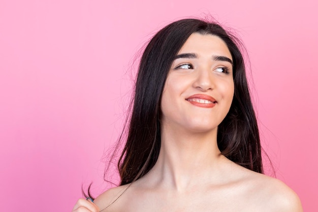 Young lady smiling and looking aside