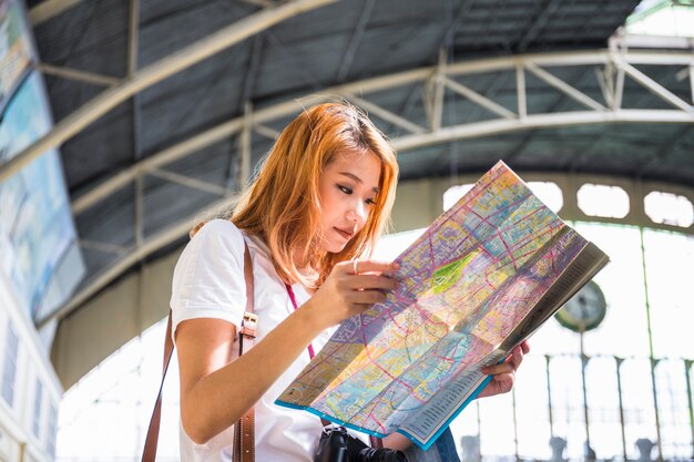 Young lady with map