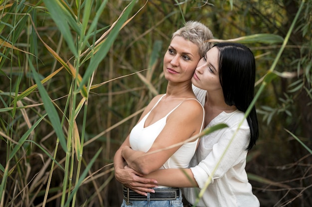 Free photo young lesbian couple hugging