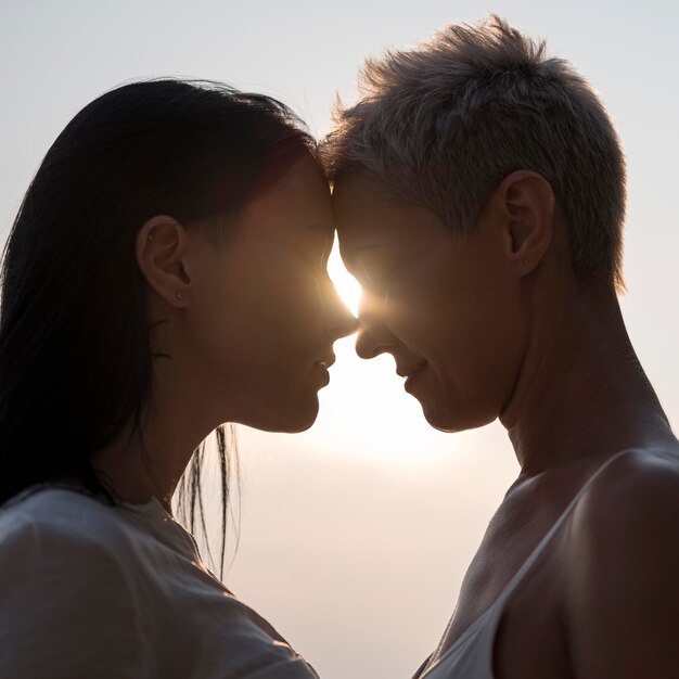 Young lesbian couple at sunset