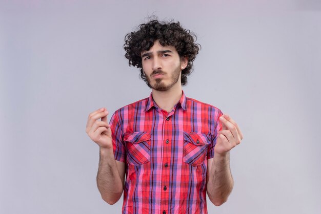 Young male curly hair isolated  colorful shirt snapping fingers