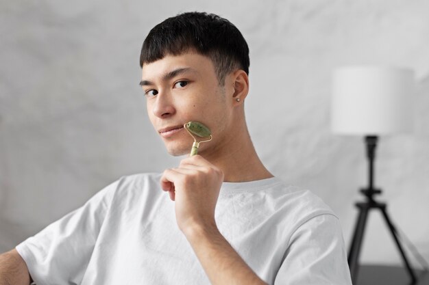 Young male doing selfcare routine