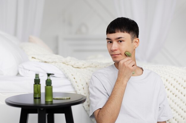 Young male doing selfcare routine