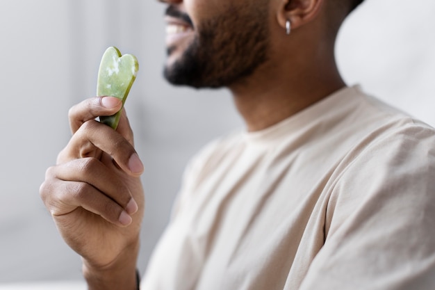 Young male doing selfcare routine