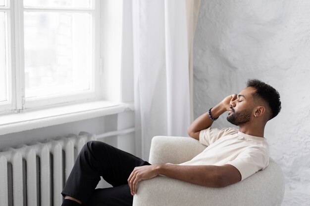 Young male doing selfcare routine