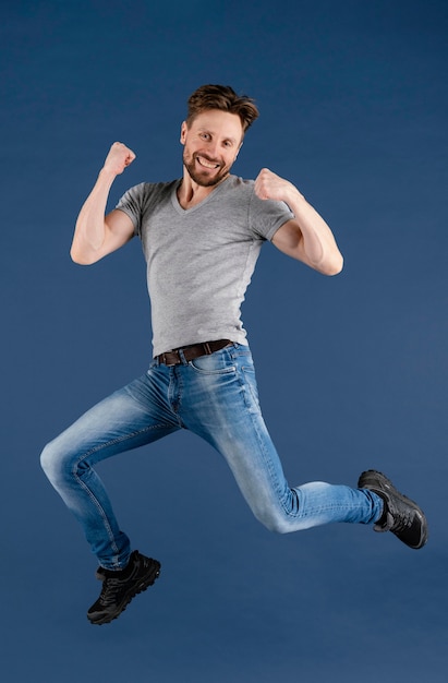 Free photo young male jumping