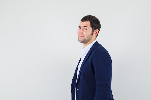 Young male looking at camera in shirt