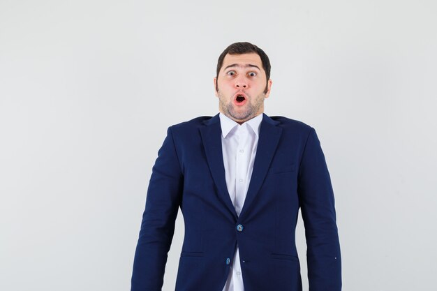 Young male looking at camera in shirt