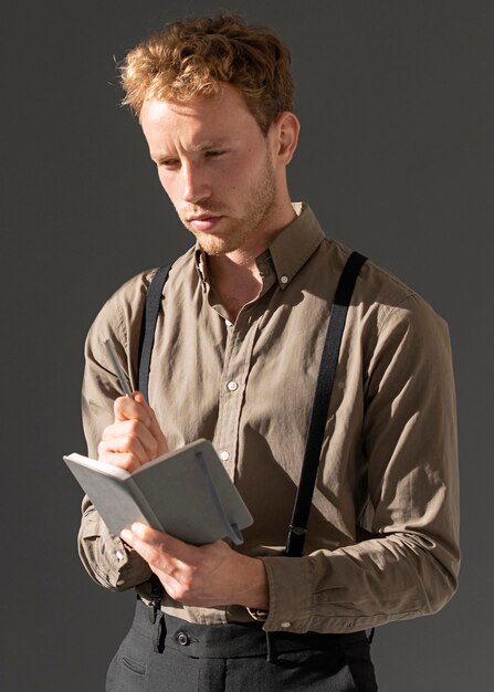 Young male model reading