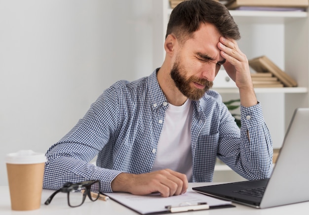 Young male at office working mock-up