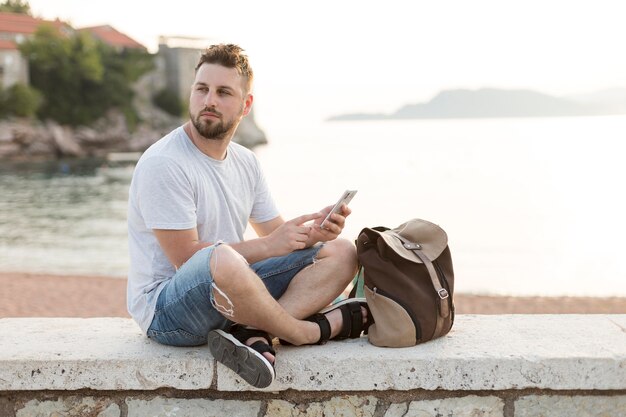 Young male traveler in montenegro