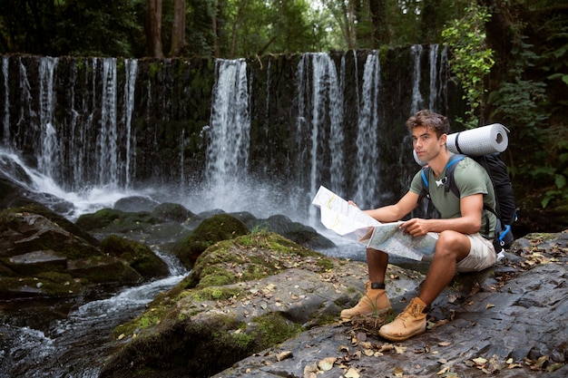 Young male traveler ready for a hike