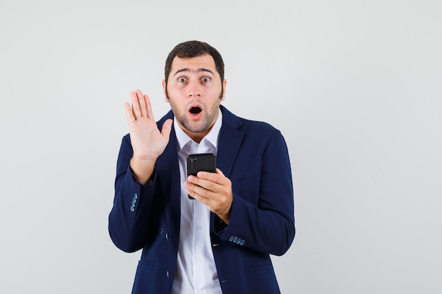 Young male using mobile phone