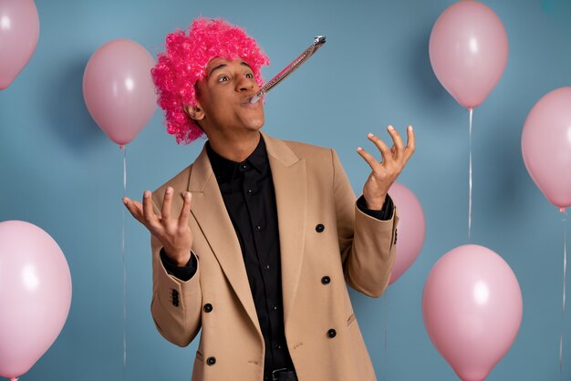 Young man celebrating at a birthday party