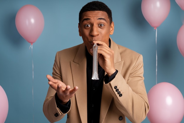 Young man celebrating at a birthday party