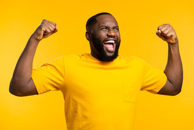 Young man celebrating