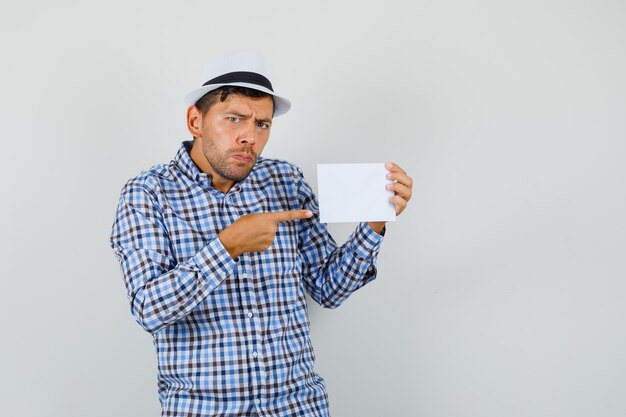 Young man in checked shirt