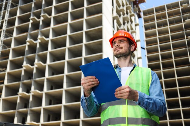 Young man civil engineer in safety hat