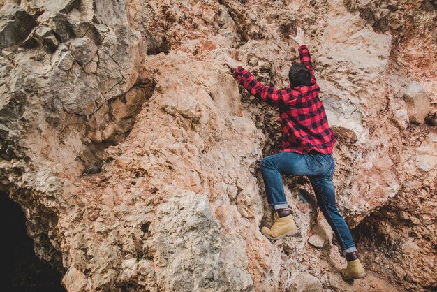 Young man climbing