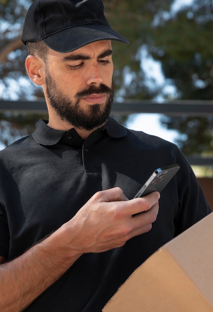 Free photo young man delivering an order