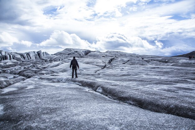 Young man doing the glacier trekking in Iceland