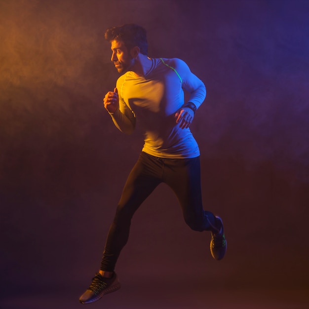 Young man doing jumping exercise