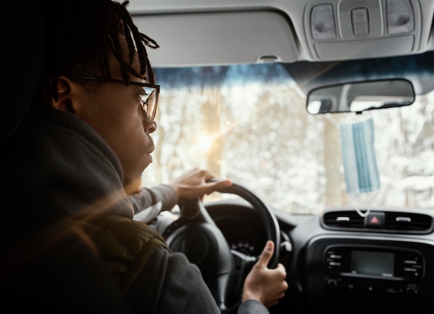 Young man driving the car