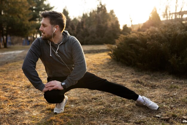 Young man exercising outdoors in the park