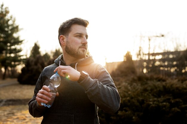 Young man exercising outdoors in the park