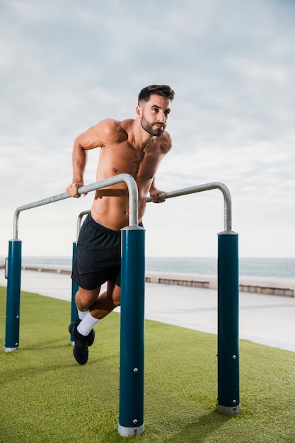 Young man exercising routine outdoor