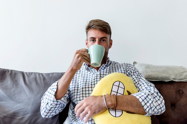 Young man having a coffee