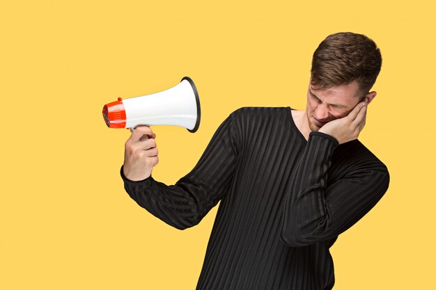 young man holding a megaphone