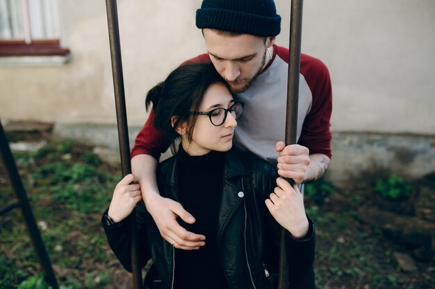 Young man hugging his girlfriend