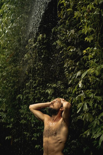 young man in the jungle Bali Indonesia