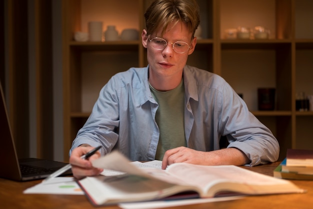 Young man learning in a virtual classroom